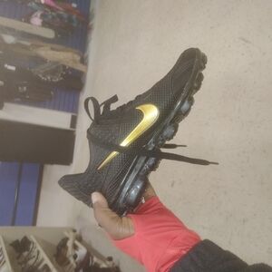 Nike Black and Gold Sneakers